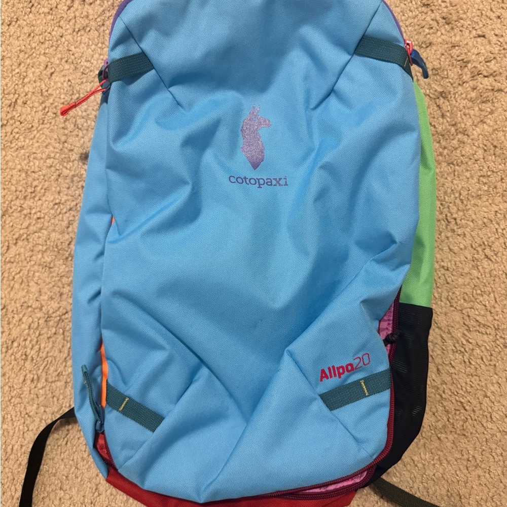 Cotopaxi Allpa 20L Backpack in Blue, Green, and Red